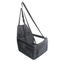 Showlu Waterproof Pet Car Seat Carrier folding nylon travel hammock installed in a car, offering protection and comfort for pets during travel.