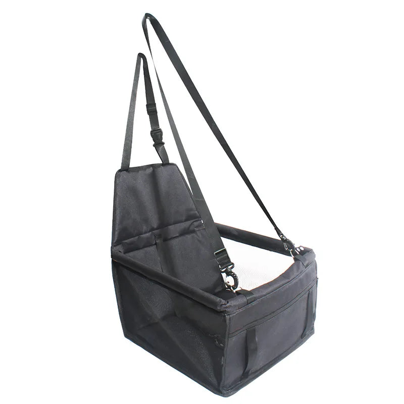 Showlu Waterproof Pet Car Seat Carrier folding nylon travel hammock installed in a car, offering protection and comfort for pets during travel.