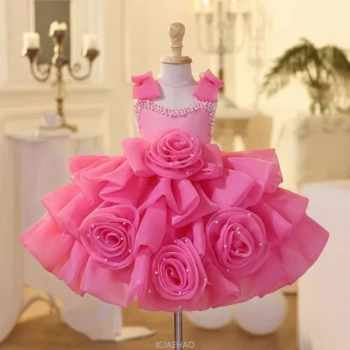 Girls first birthday princess dress by Showlu Fashion, floral gown with ruffles and bow for wedding, party, or special occasions.