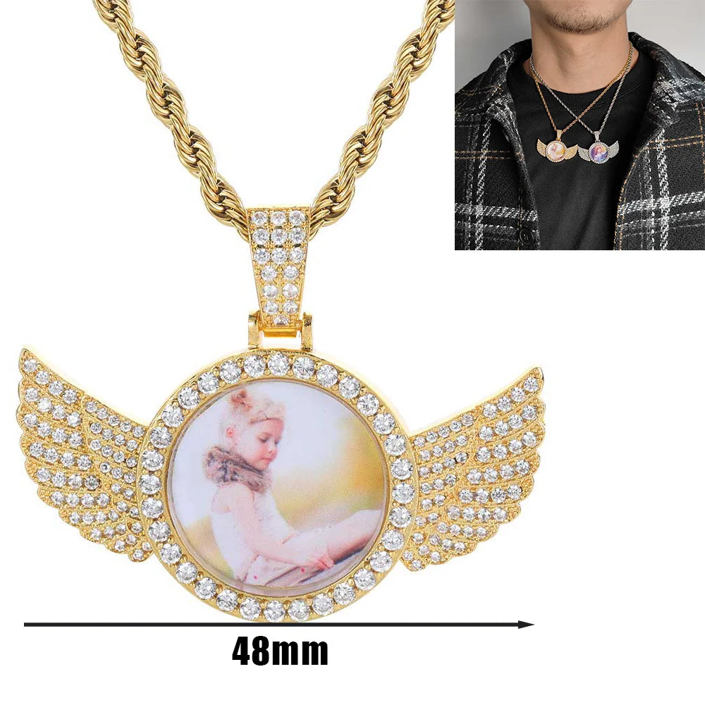 Custom angel wing round photo necklace with personalized pendant and tennis chain, featuring a space for a custom picture.