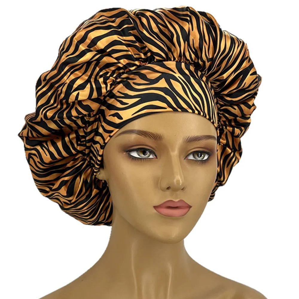 Leopard print women's sleep bonnet with wide elastic band, soft fabric, ideal for dry and textured hair, curl-enhancing sleep cap