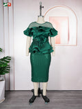 African women's sequin peplum dress with off-shoulder design, perfect for wedding or party events.