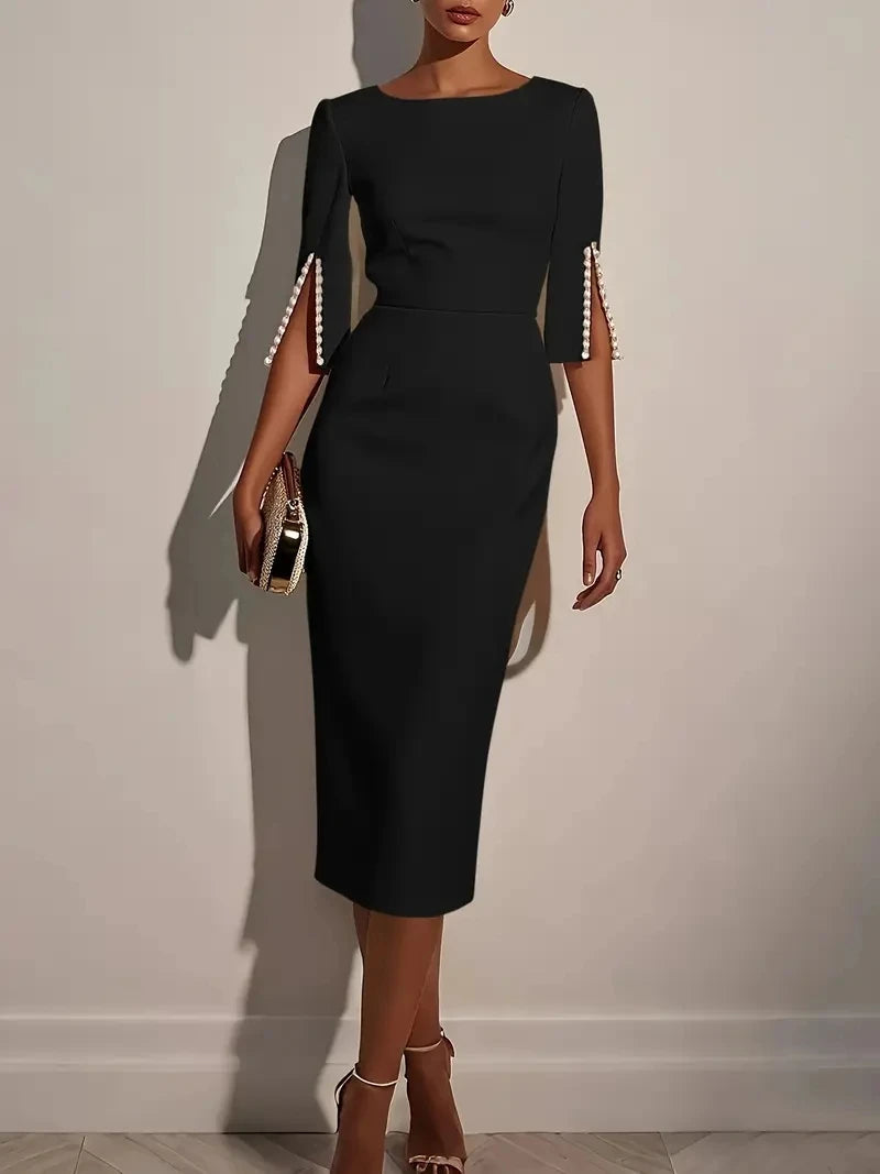 Showlu Women's beaded slim fit midi dress with round neck, elegant sheath style, showcasing intricate bead details and tailored fit.