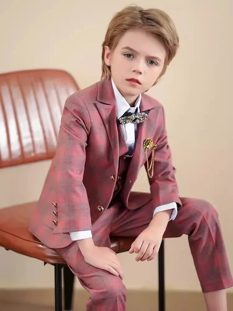 Red boys' tuxedo suit by SHOWLU FASHION STORE, featuring a 3-piece set with jacket, vest, and pants for kids' weddings and parties.