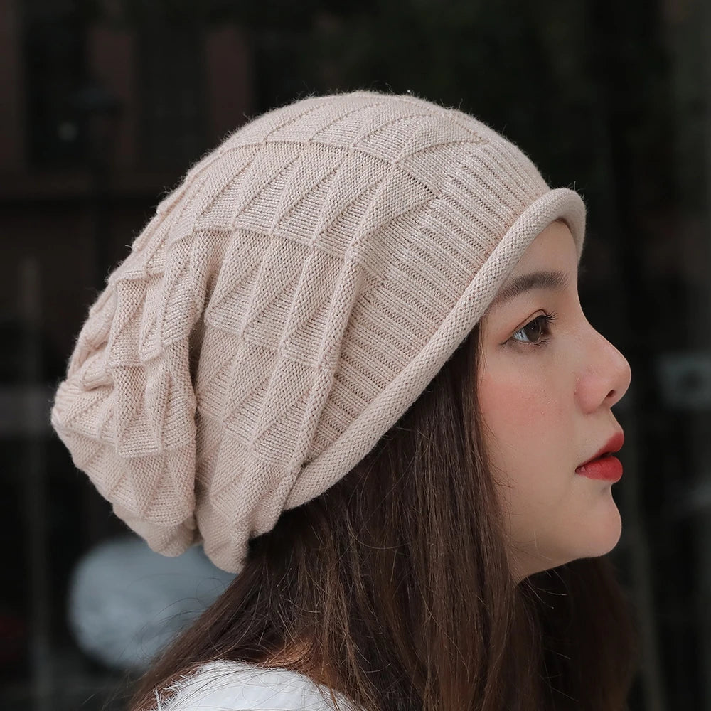 Warm women's slouchy knitted beanie hat with wool, suitable for outdoor snow skiing, featuring a cozy, baggy winter cap style.