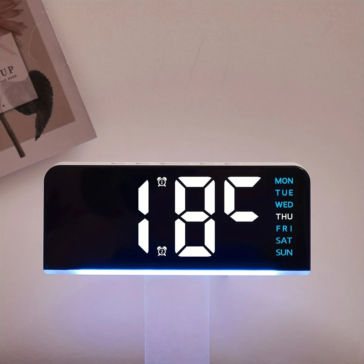 Showlu Smart LED digital alarm clock with mood light and USB display, featuring a sleek modern design and easy-to-read digital screen.