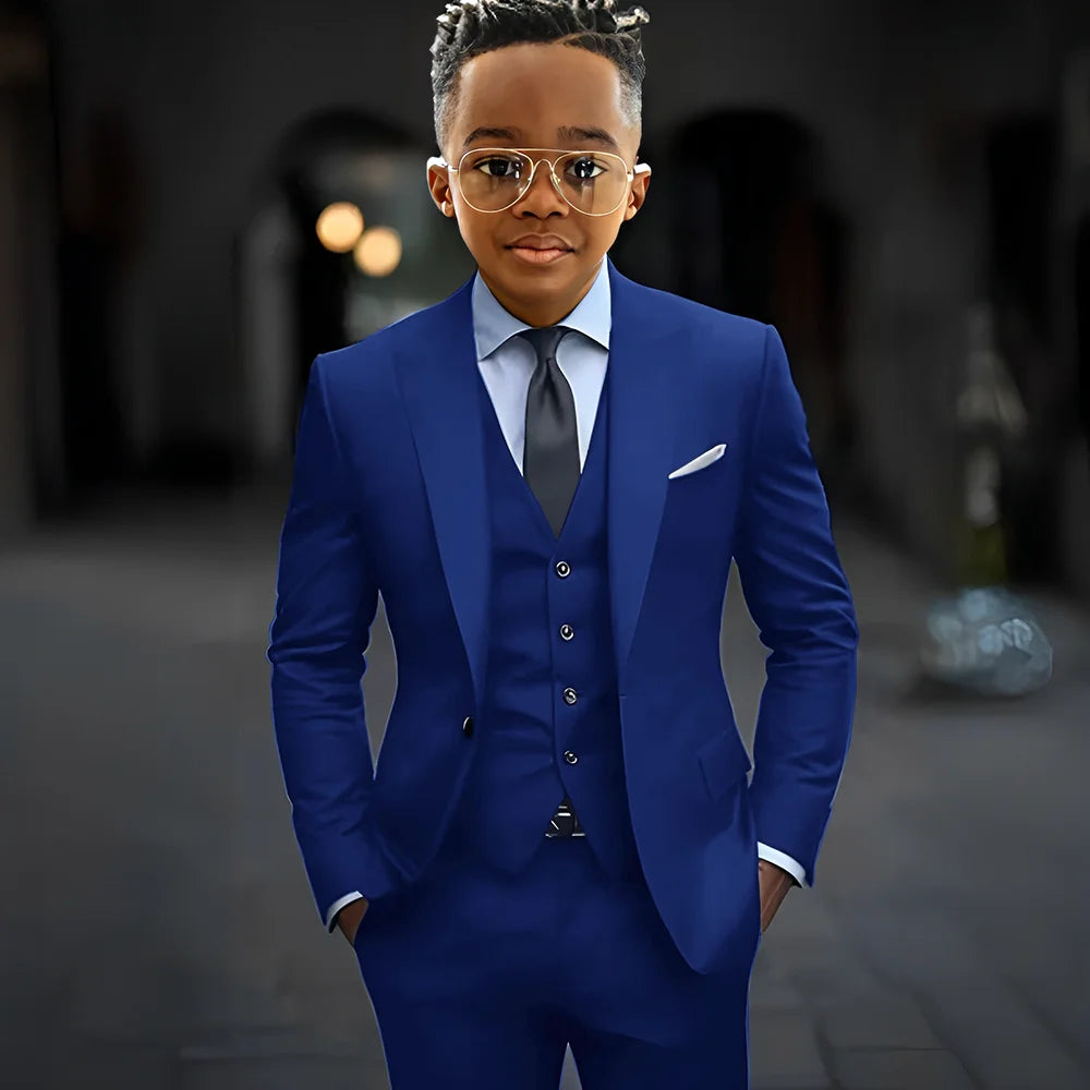 Dark grey boys' suit set featuring a slim fit three-piece design with a single-breasted jacket, peak lapel, pants, and vest by Showlu Fashion