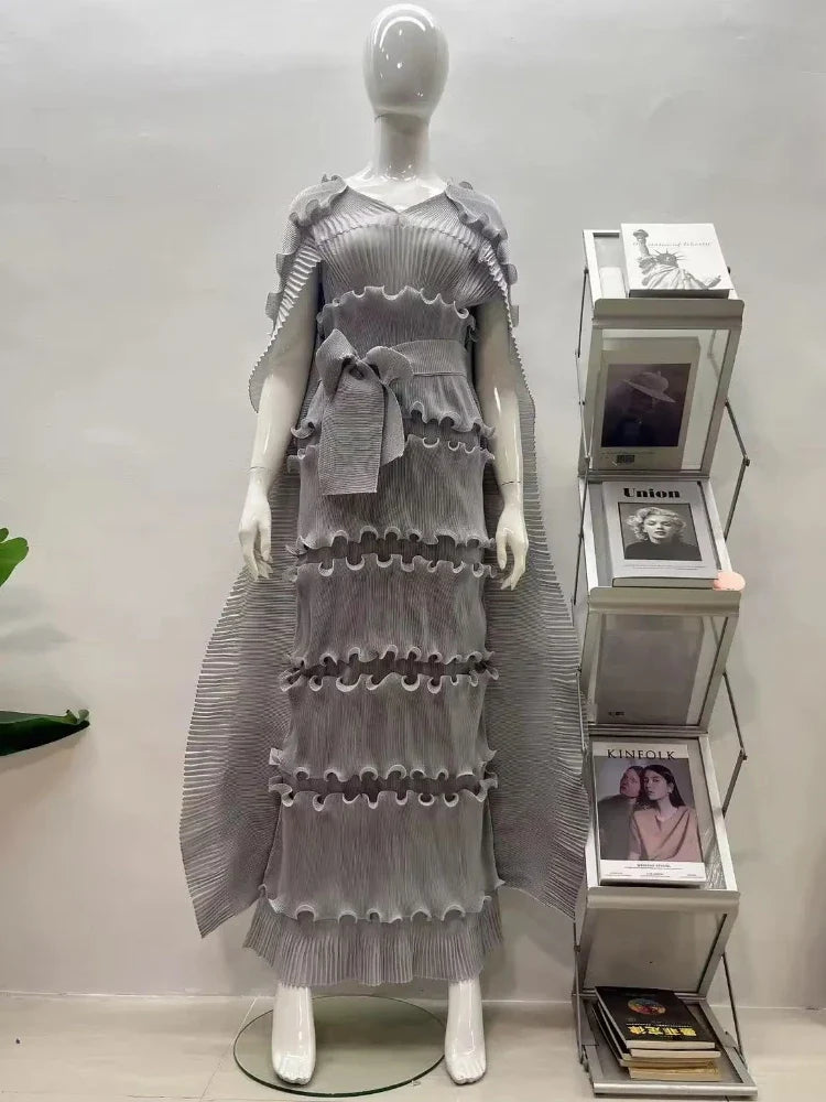 Women's EGRM Miyake Pleated Cake Dress with loose fit, sleeveless design and V-neck, stylish gown for elegant occasions.