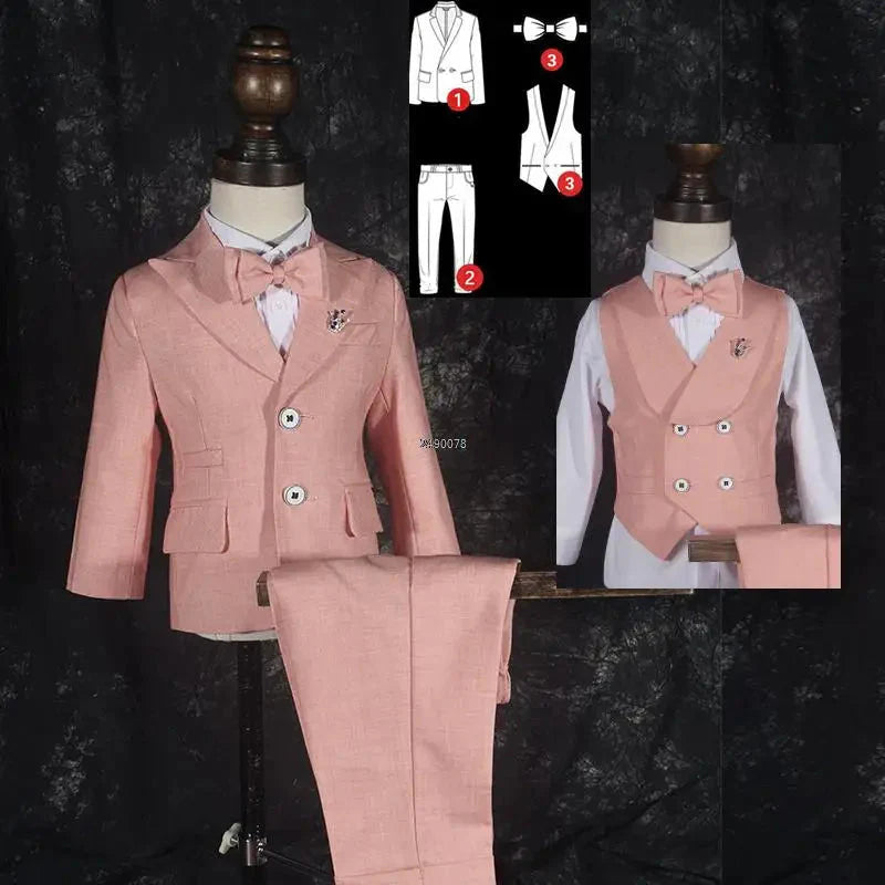 Purple boys' formal wedding suit with five-piece tuxedo set including jacket, vest, pants, shirt, and bow tie for special occasions