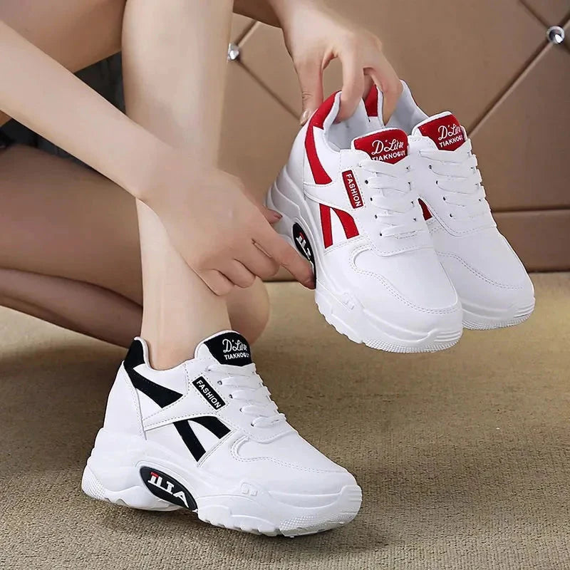 Showlu Fashion women's platform chunky sneakers in black PU leather with lace-up design and thick sole.