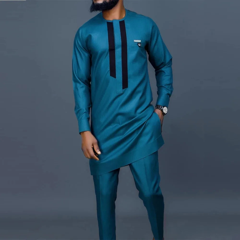 Men's white Kaunda suit by Showlu Fashion, traditional African 2-piece cotton set with intricate embroidery and comfortable fit.