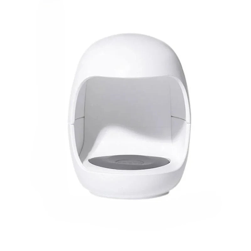 Mini LED Nail Dryer by Showlu Smart General, compact device with LED lights for quick at-home gel nail drying.