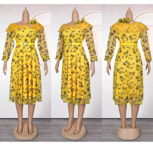 African print maxi dress by SHOWLU FASHION STORE, elegant plus size party gown with vibrant patterns and flowing fabric.
