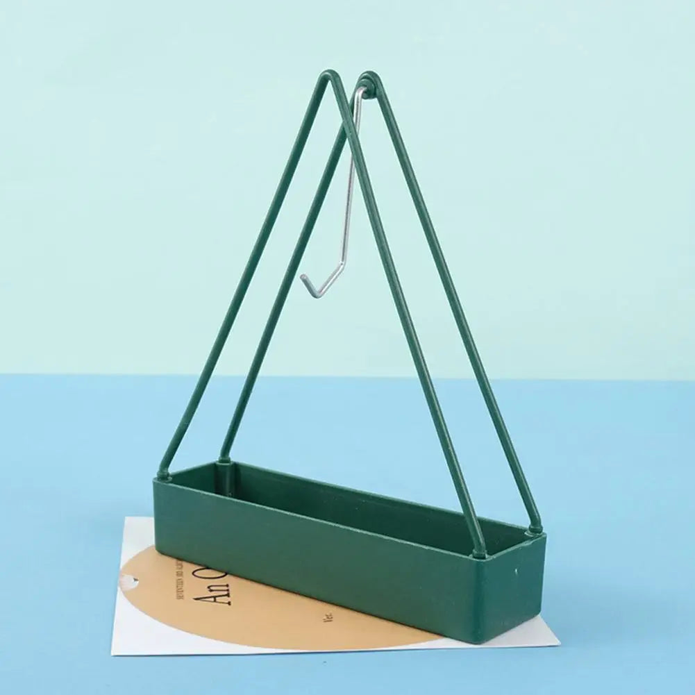 Modern plastic mosquito coil holder and incense burner frame with a sleek design, ideal for household bedroom use.