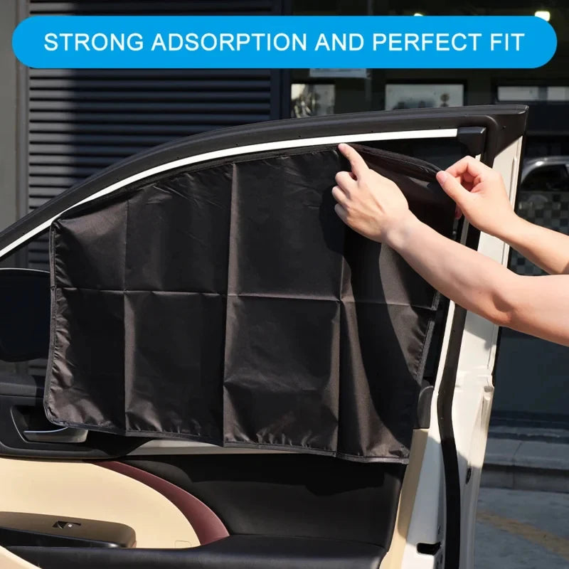 Magnetic Showlu Smart General car sunshade with black fabric, mounted on a vehicle windshield to block sunlight and reduce glare
