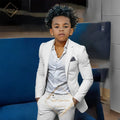 Boy wearing orange slim fit 2-piece suit by SHOWLU FASHION STORE, featuring a single-breasted twill jacket and matching trousers.