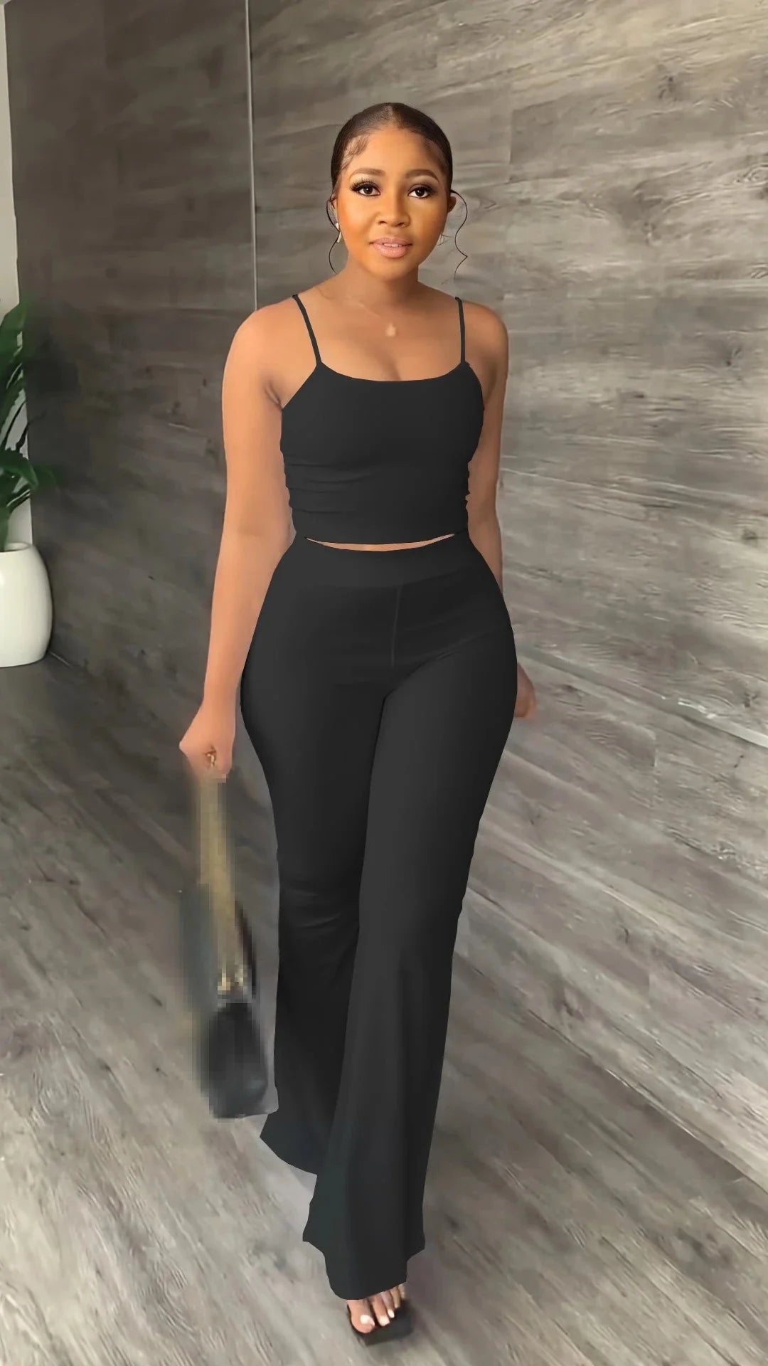 Stefion women's 2-piece summer set with sleeveless crop top and long pants, casual and stylish for warm weather.
