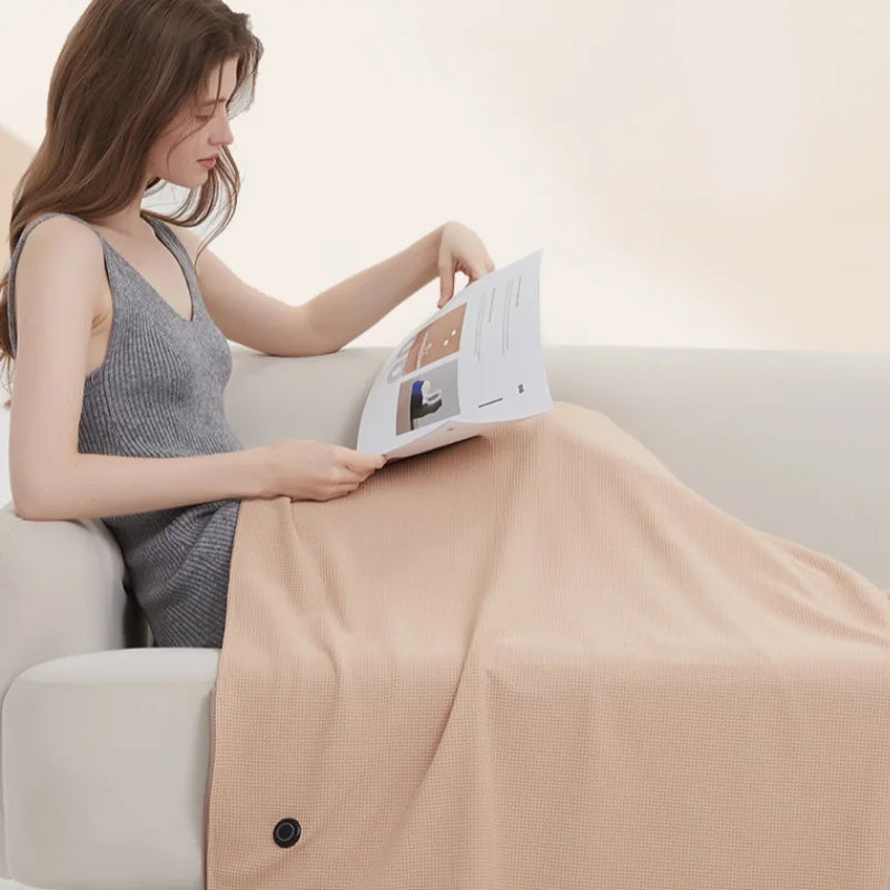 Showlu Smart General USB heated blanket shawl with 3-level electric warmth control, featuring a cozy, soft fabric and portable design.