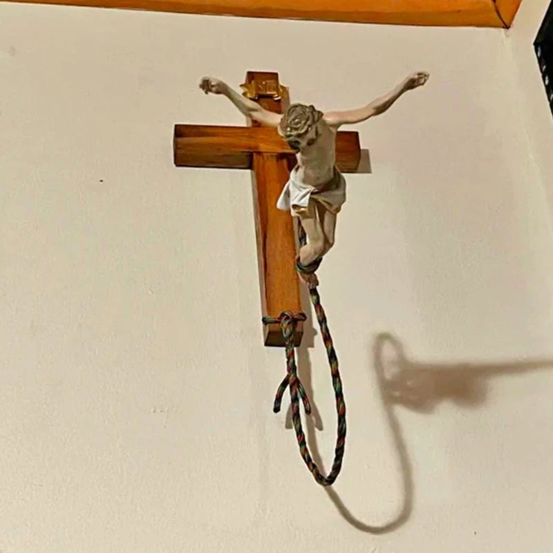 Handmade wooden resin sculpture of Bungee Jumping Jesus, a unique religious artwork decorative wall ornament.