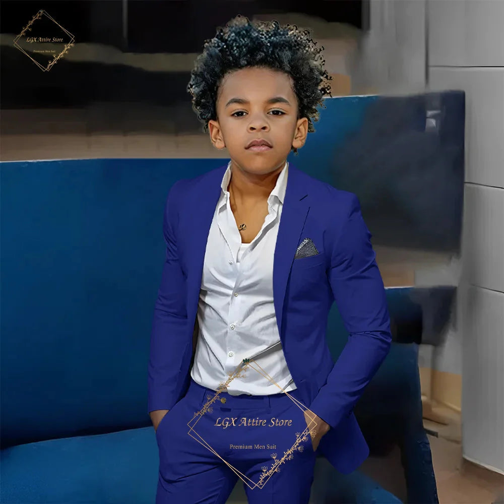 Boy wearing SHOWLU FASHION STORE LEOSOXS orange slim fit 2-piece suit with single-breasted twill jacket and matching pants.