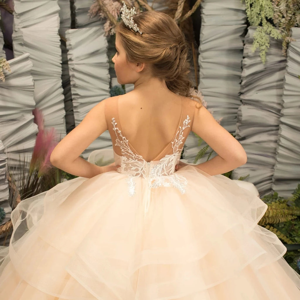 Light champagne flower girl dress by Gdybao with tulle tiered ball gown design, perfect for weddings and special occasions.