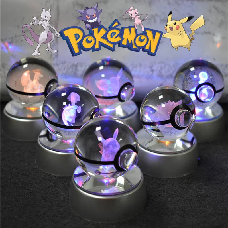 Pokemon 3D crystal ball night light by Miniso, LED glass Pokeball lamp illuminating with a detailed Pokemon design.