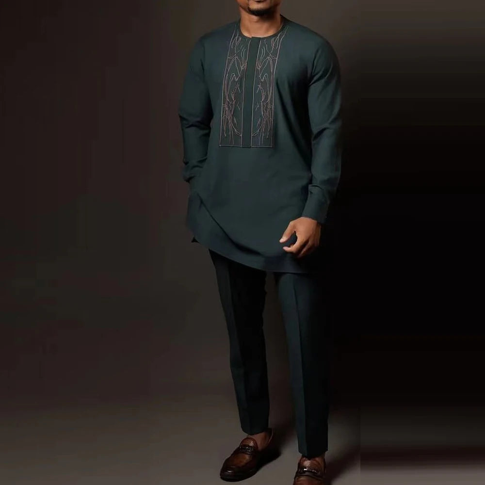 Showlu Men's African Kaftan Set made of cotton blend, featuring a traditional 2-piece wedding suit with intricate embroidery and vibrant colors.