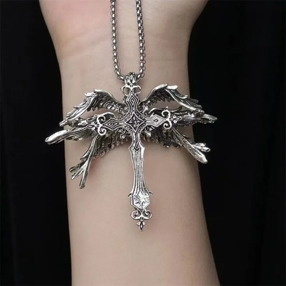 Retro gothic Jesus wings cross pendant necklace made of zinc alloy with detailed religious design.