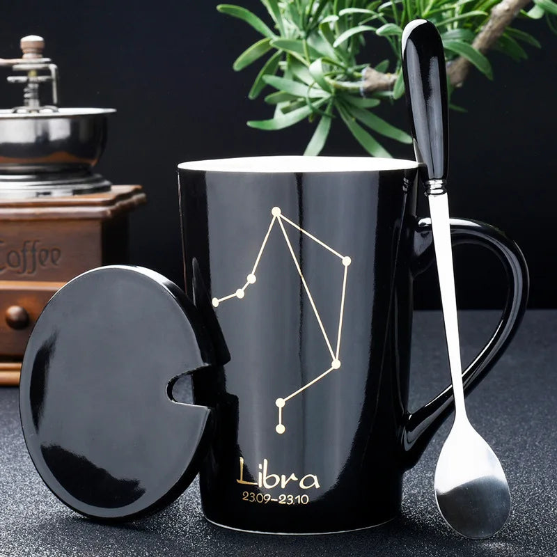 Showlu 12 Zodiac Signs ceramic coffee mug with lid and spoon in black, featuring zodiac symbols and a modern design.