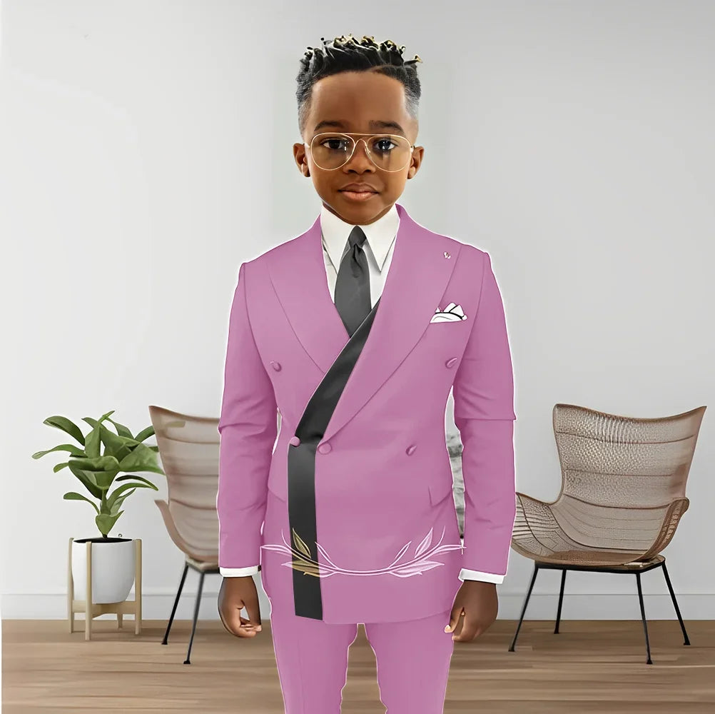 Boy wearing a double-breasted blazer and pants tuxedo set from Showlu Fashion, suitable for weddings and formal events for ages 2-16.