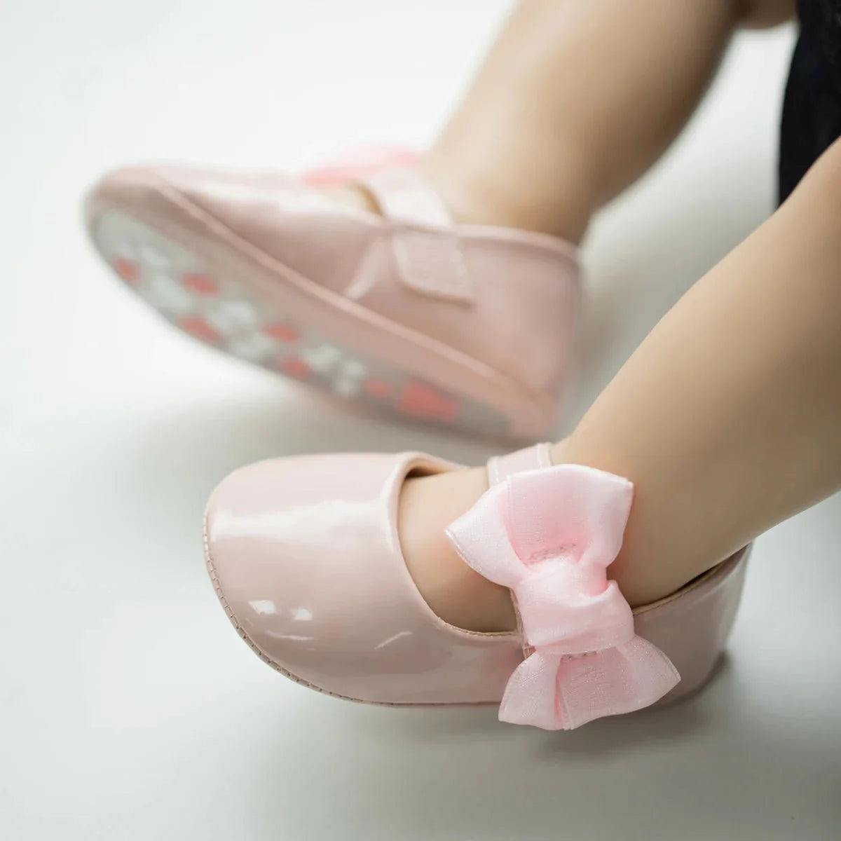 Baby girls Meckior PU leather bowknot shoes from SHOWLU FASHION STORE, non-slip first walkers with cute bow detail.