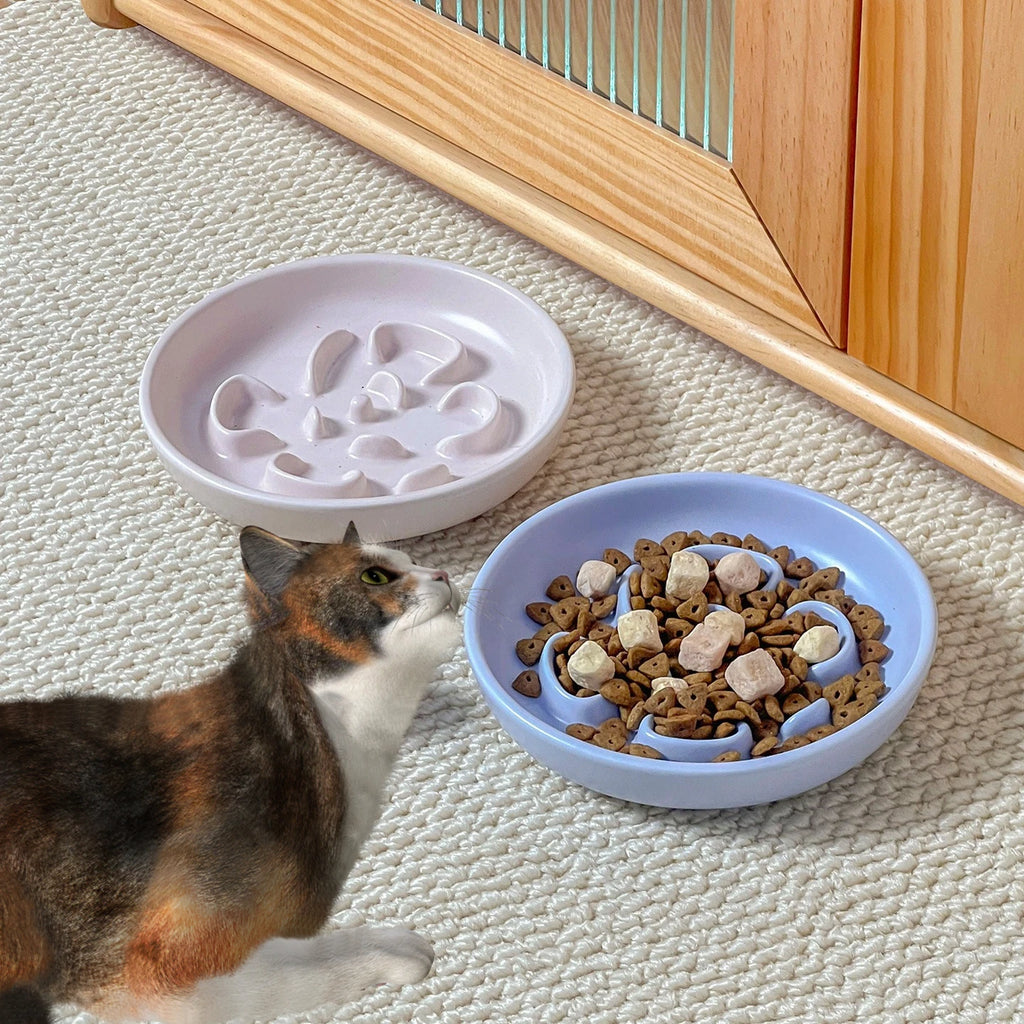 Creative clover-shaped slow food pet bowl by Showlu Fashion Store, round anti-spill cat and dog bowl for easy feeding.