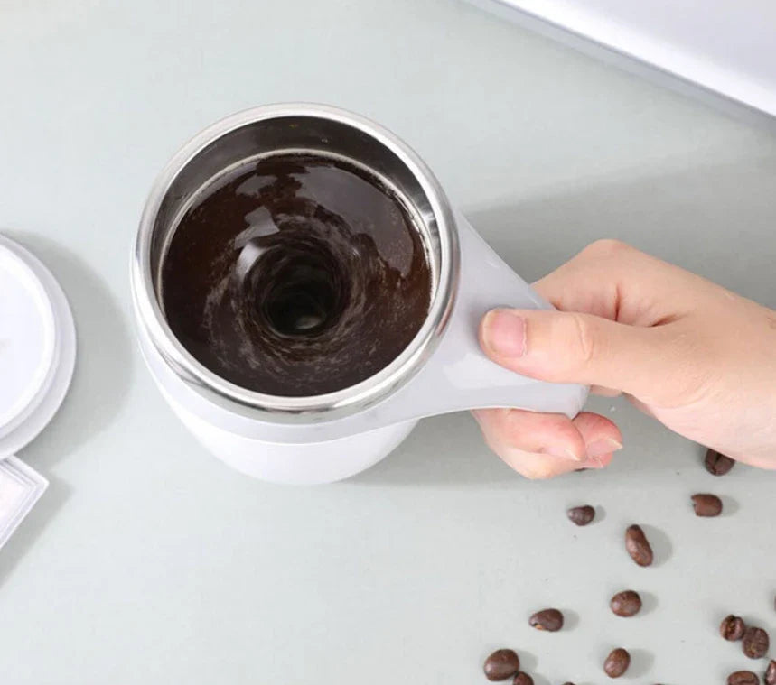 Showlu automatic self-stirring stainless steel coffee mug with magnetic stirring mechanism and ergonomic handle.