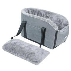 A grey portable pet car seat with a removable plush cushion and black carrying straps.