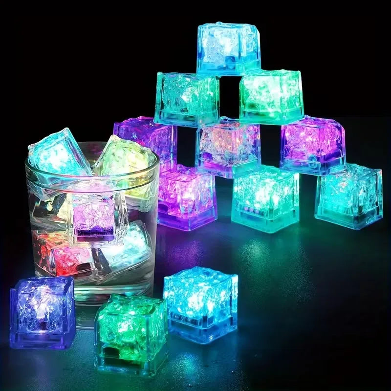 Six waterproof LED glowing ice cube lights from Showlu Smart General, liquid sensor drink mood cubes for party decor.