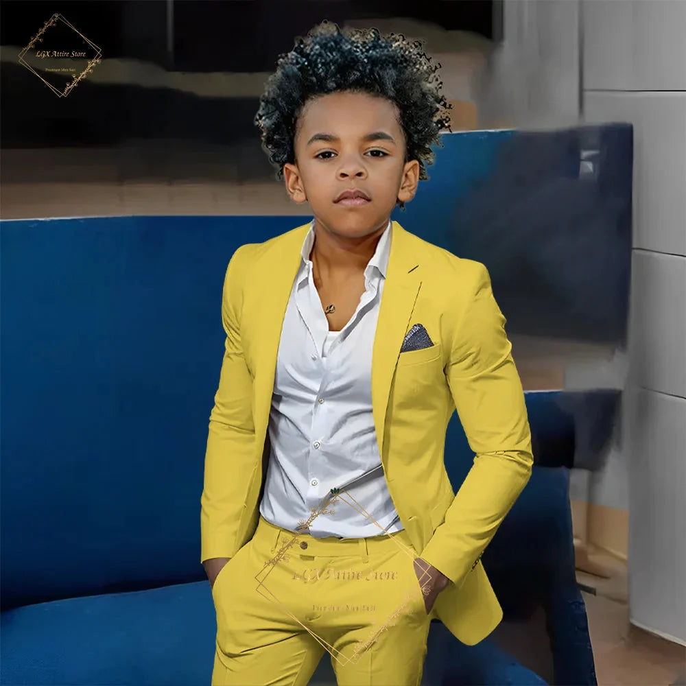 Boy wearing SHOWLU FASHION STORE orange slim fit 2-piece suit, single-breasted twill set for boys, formal occasion attire.