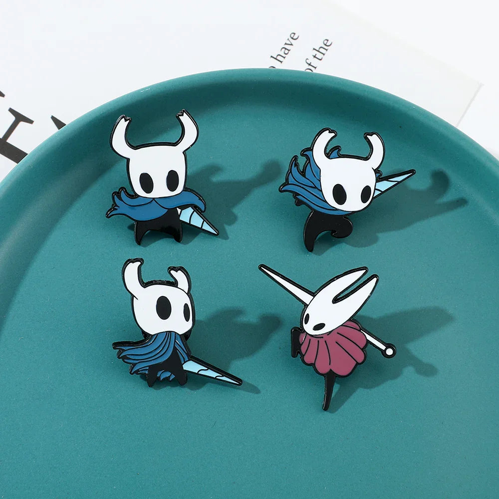 Hot Toys Hollow Knight enamel pin featuring zinc alloy metal game badge, detailed design of the Hollow Knight character.