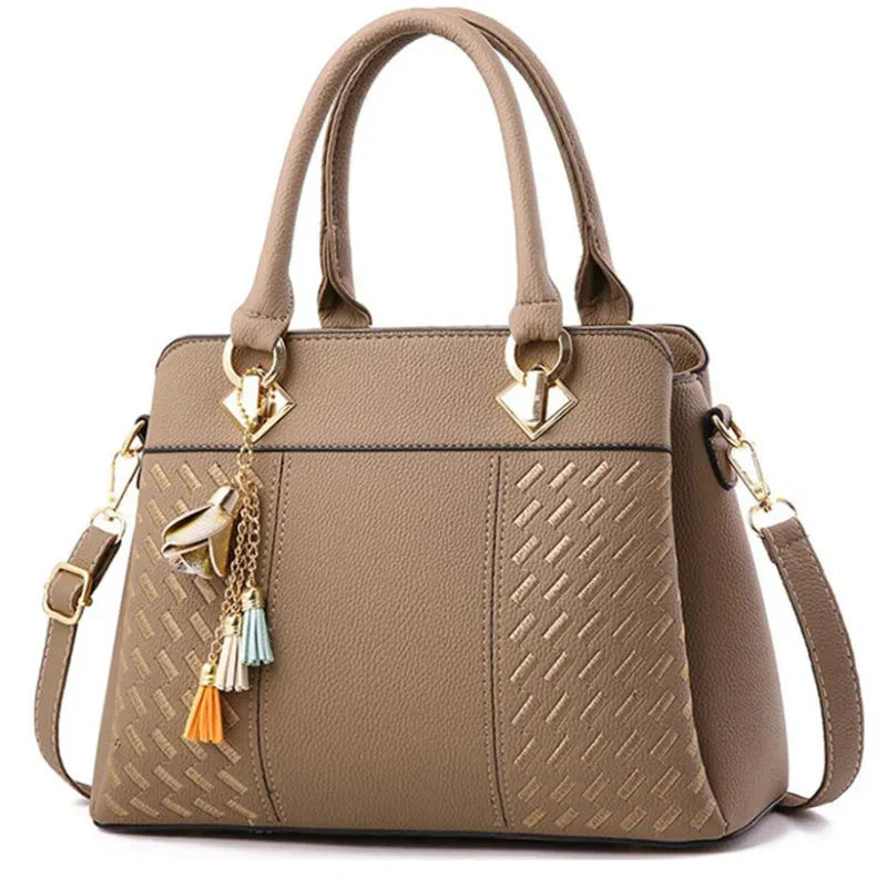 Large capacity SHOWLU FASHION STORE Yogodlns luxury embroidery PU leather tote bag with tassel, stylish and spacious for daily use.