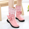 Girls winter snow boots by SHOWLU FASHION STORE, warm cotton-lined mid-calf shoes in black PU leather with sturdy soles.