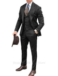 Men's burgundy slim fit 3-piece tuxedo with peak lapel, by Showlu Fashion, featuring jacket, vest, and trousers on a model.