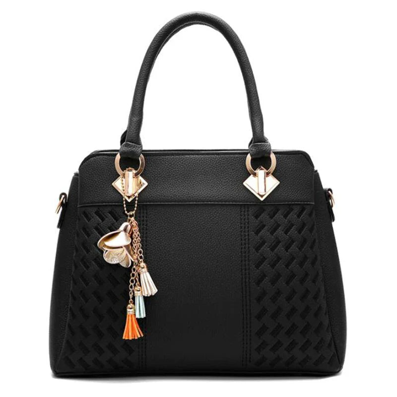SHOWLU FASHION STORE luxury embroidery PU leather tote bag with tassel, large capacity, stylish design, and sturdy handles.