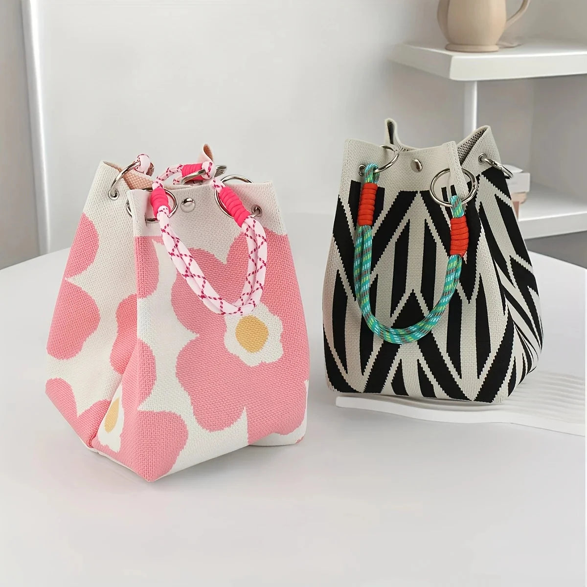 Women's vintage floral knit tote bag with adjustable straps, metal rings, snap closure, lightweight design, perfect for casual travel.