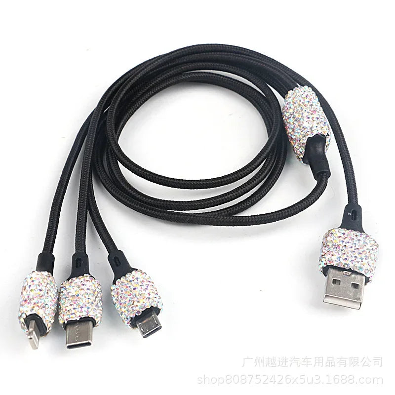 Pink crystal Showlu dual USB car charger with 3-in-1 charging cable for quick device charging in vehicles.
