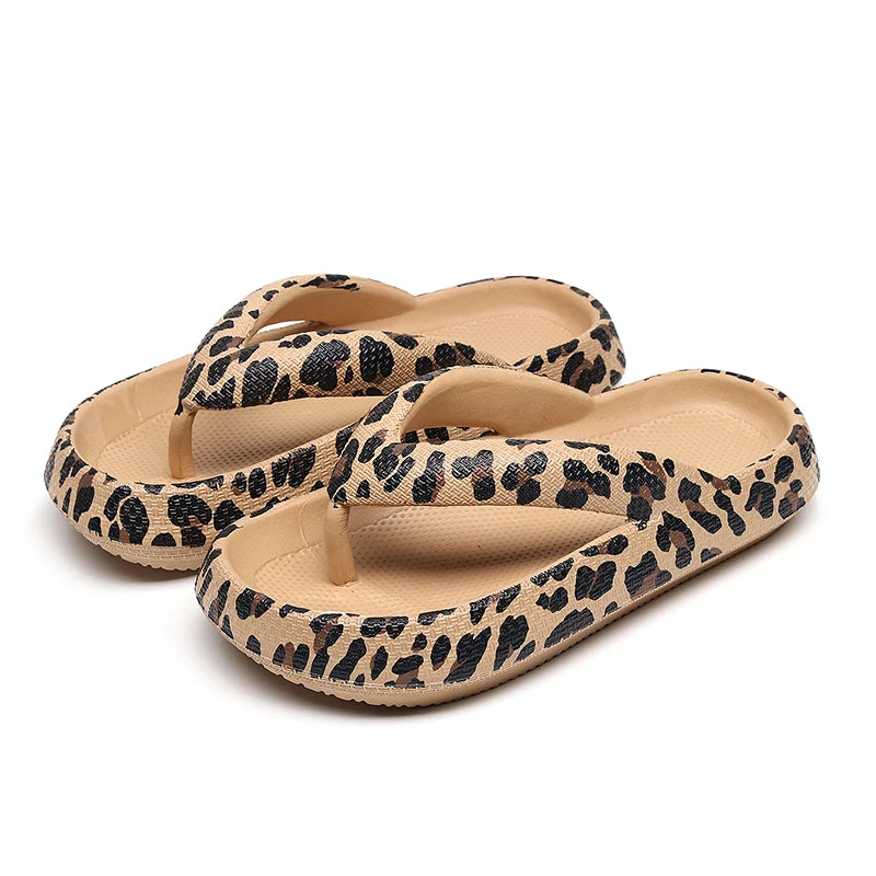 Leopard print women's comfort flip-flops with thick soles, soft cloud slippers, ideal for beach, travel, and vacation wear.