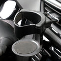 Showlu Smart General car cup holder expander fitting into vehicle cup holder, expands space for additional cups or bottles.