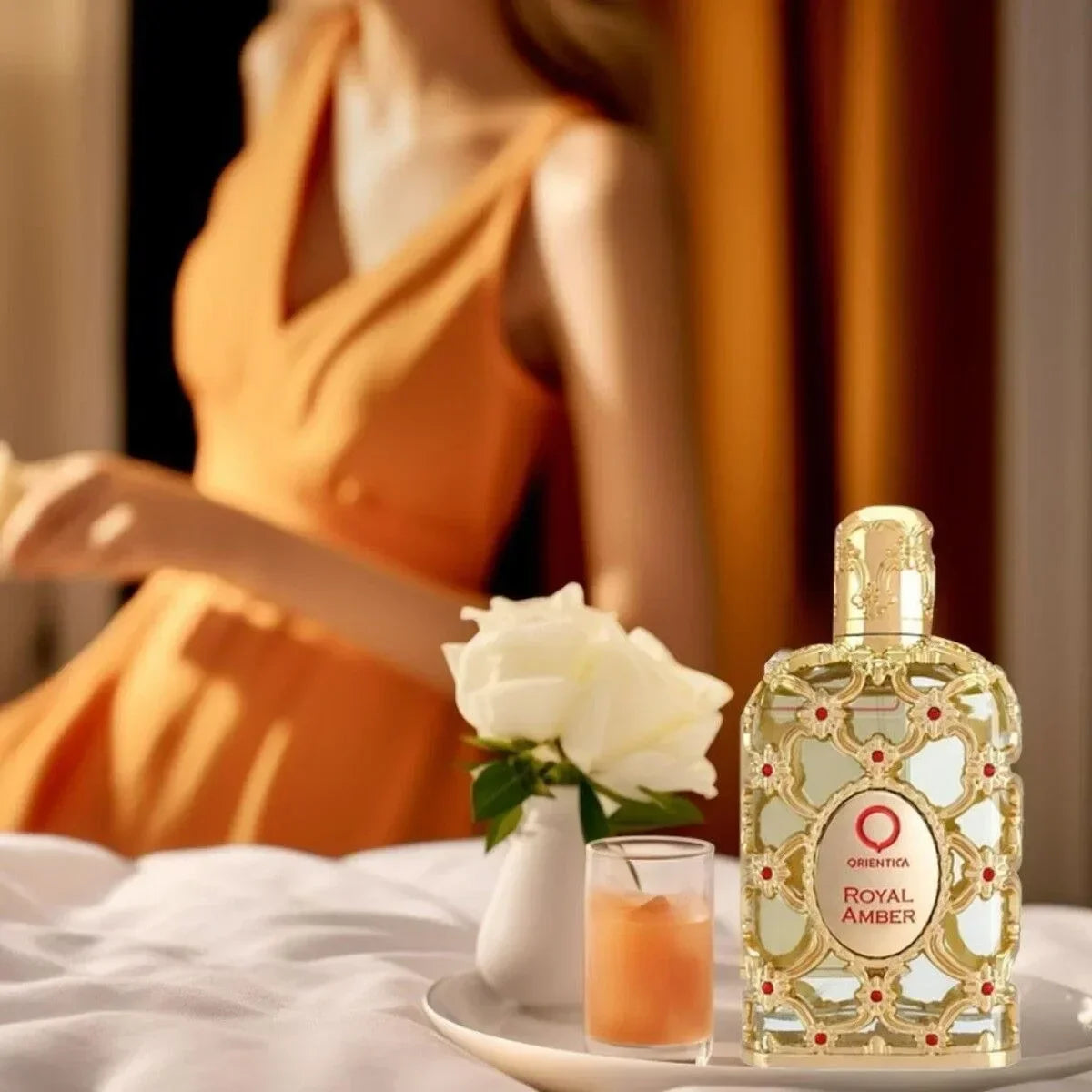 Unisex DJBS Royal Amber Eau De Parfum 2.7 oz bottle with floral fragrance and amber notes, elegant design.