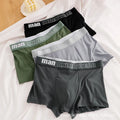Four pairs of men's cotton boxer briefs in black, sizes L to 4XL, featuring breathable, comfortable fit for sports and everyday wear.