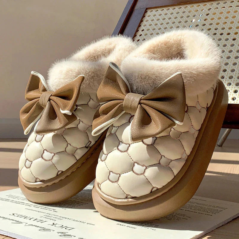 Rimocy Women's snow boots by SHOWLU FASHION STORE with fluffy butterfly accents and platform ankle design, ideal for winter wear.