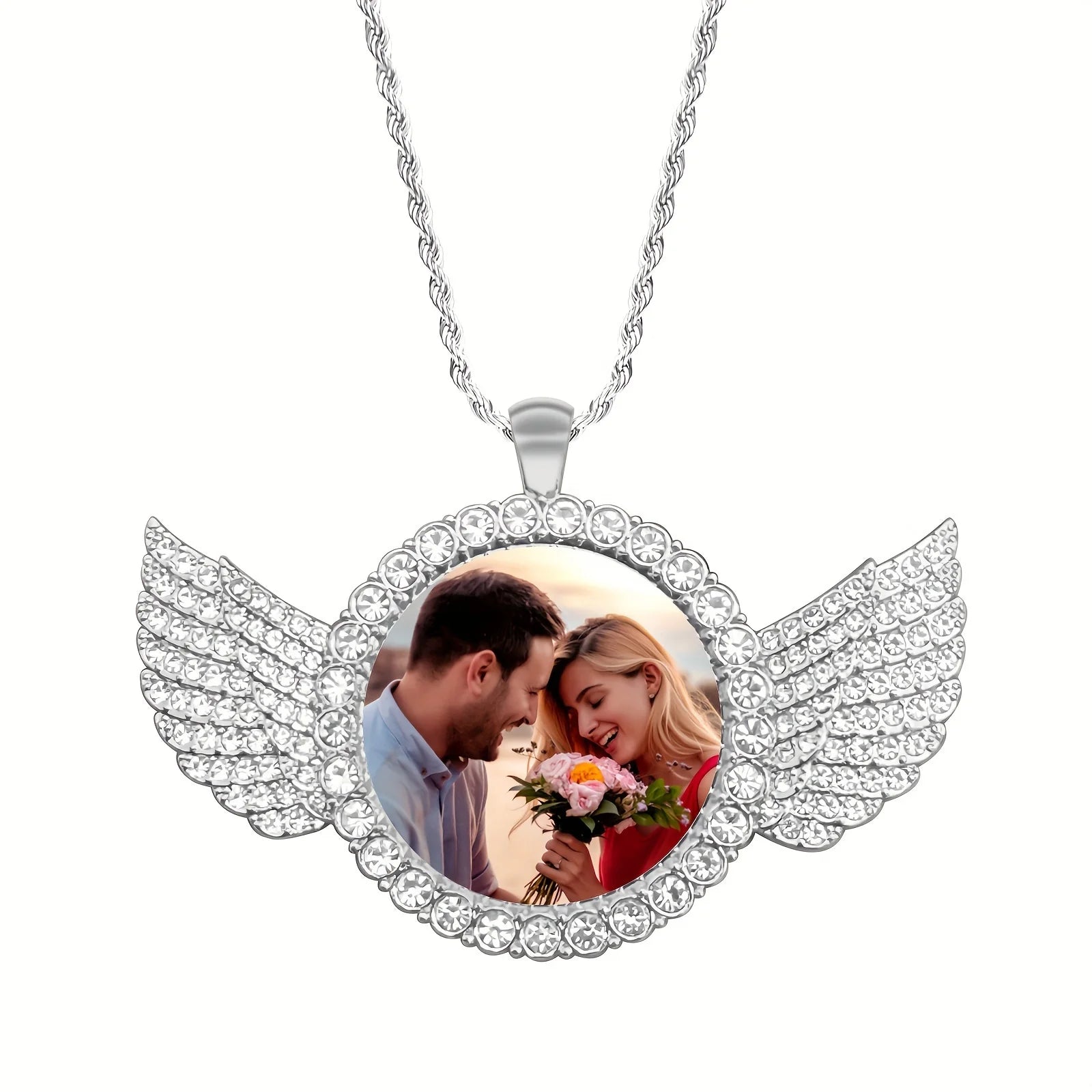 Customized angel wing round photo necklace with a personalized pendant, perfect for capturing memories and special occasions.