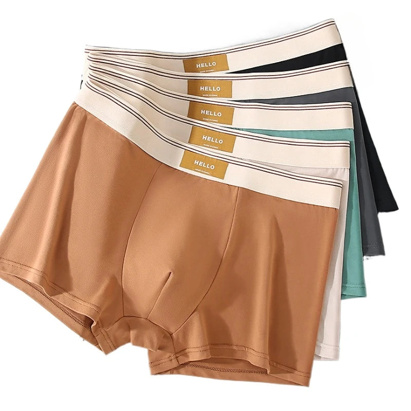 Breathable men's boxer shorts made of milk silk, showing a comfortable fit and smooth fabric in a stylish design.